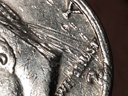 2011 Kennedy half dollar die clash error showing transferred reverse design elements visible in obverse fields