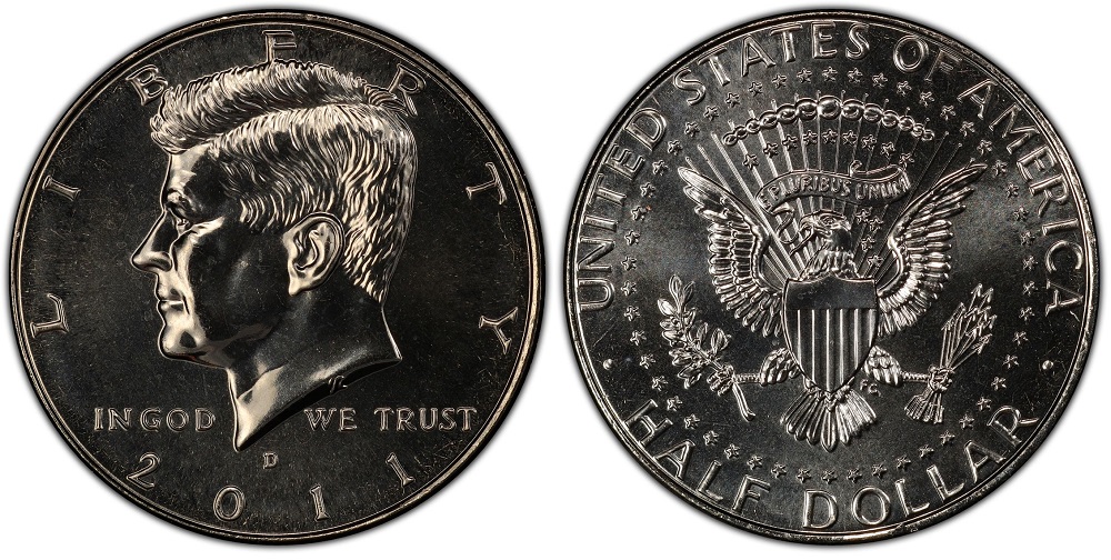 2011 Kennedy half dollar grading strip showing four condition tiers from worn to gem uncirculated